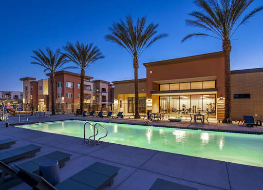 Swimming pool at night at Estrella Springs at Canyon Trails Apartments, Goodyear, Arizona