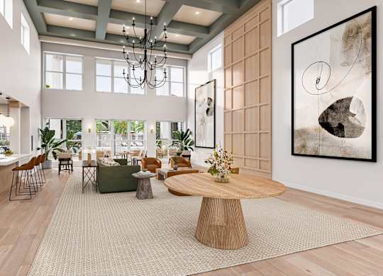 A modern living room with a large wooden coffee table and a chandelier hanging from the ceiling at Maison at Solivita Marketplace Apartment Homes, Florida