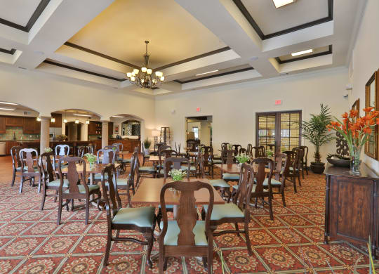 a dining room with tables and chairs in a lobby at Cedars of Elk Drive 55+ Apartments, Texas, 76028