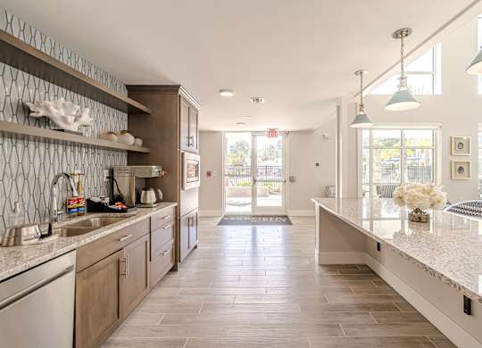 Spacious community kitchen at Sandpiper Glen 62+ Apartments, Orlando, FL