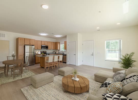 Living Area With Kitchen View at Shannon Reserve 55+ Apartments, Georgia