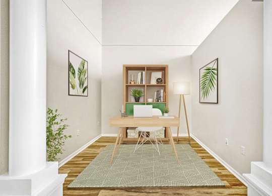 A room with a desk and a chair in the middle.