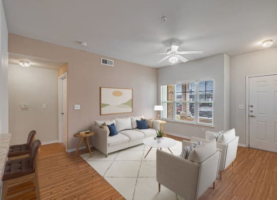 Modern Living Room at Mariposa at Spring Hollow Saginaw 55+ Apartments, Saginaw Texas