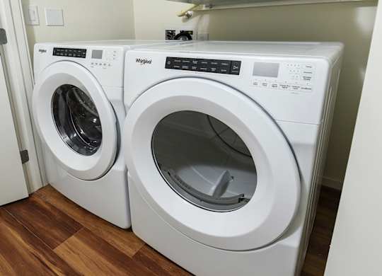 Laundry Room at Suncrest Vista at Canyon Trails 55+ Apartments, Goodyear, AZ, 85338