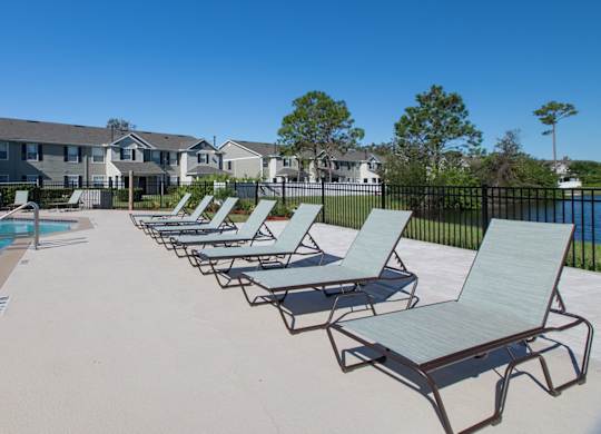 Swimming Pool With Lounge Chairs at Sunrise Pointe, Port Orange, FL, Florida, 32129