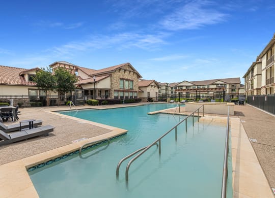 Outdoor Swimming Poolat The Portofino 55+ Apartments, Pasadena, TX 77503