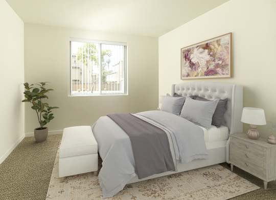 Bedroom with lamps at The Addie at Metro Center 55+ Apartments, Aurora, CO