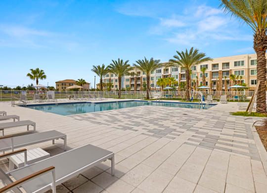 swimming pool and sundeck at Osprey Park 62+ Apartments, Kissimmee, 34758