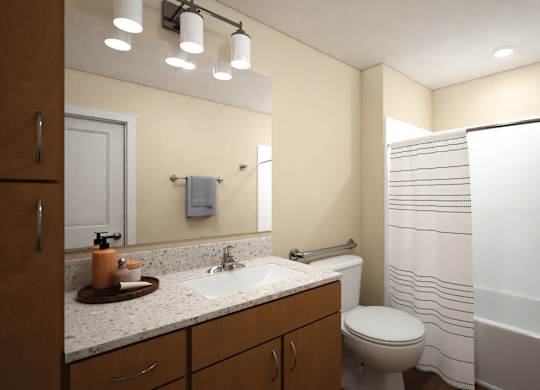 A bathroom with a toilet, sink, and bathtub.
