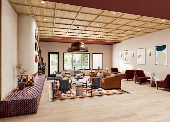 Clubhouse lounge with fireplace and contemporary furnishings at Turquoise Trail Apartments, Santa Fe, NM