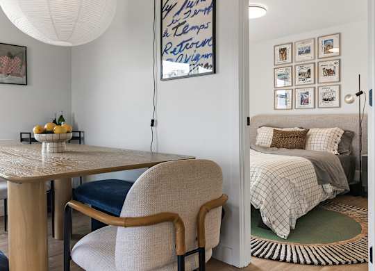 A room with a table and a chair.