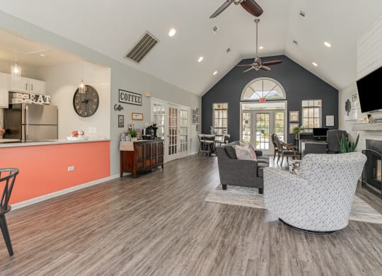 a living room with a kitchen and a dining room at Litchfield Oaks Apartments, Pawleys Island, SC