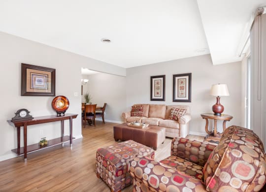a living room with a couch and a chair