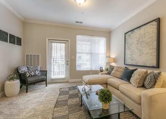 a living room with a couch and a coffee table