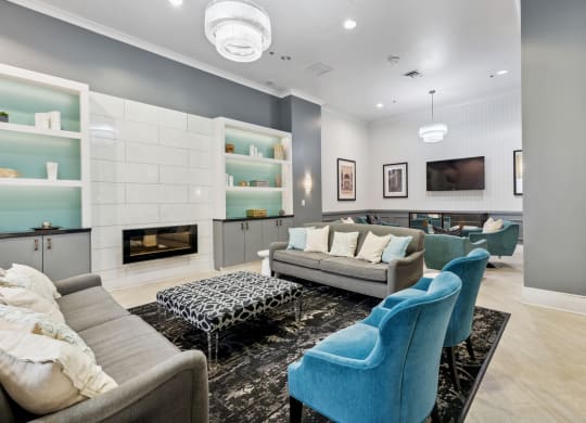 a living room filled with furniture and a fire place