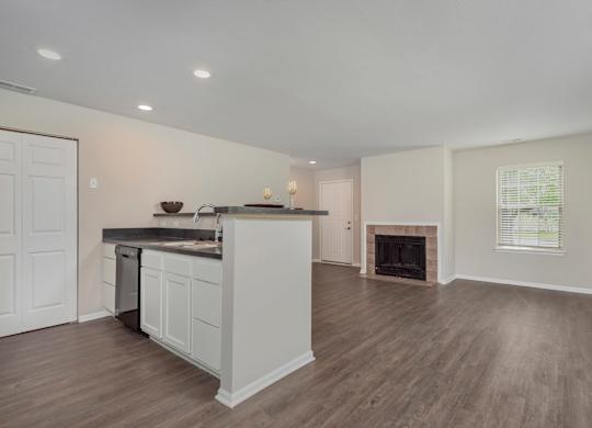 Kitchen with a white island at Camden Place Apartments, Dublin, OH, 43016