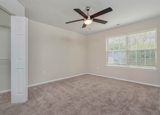 Room with a ceiling fan at Camden Place Apartments, Dublin, OH