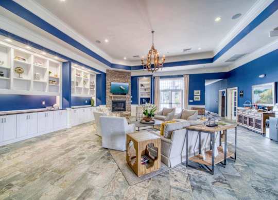 A spacious kitchen and dining area with a wooden table and chairs.