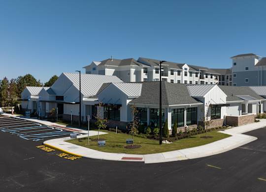 a large building with a street in front of it
