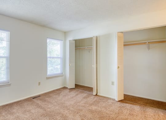 Large bedroom and closets at The Everett Apartments , Roanoke, VA 24018