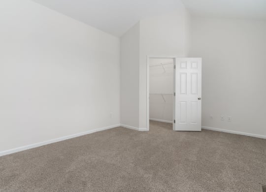 an empty room with a door to a closet at The Charleston, Ohio, 43221