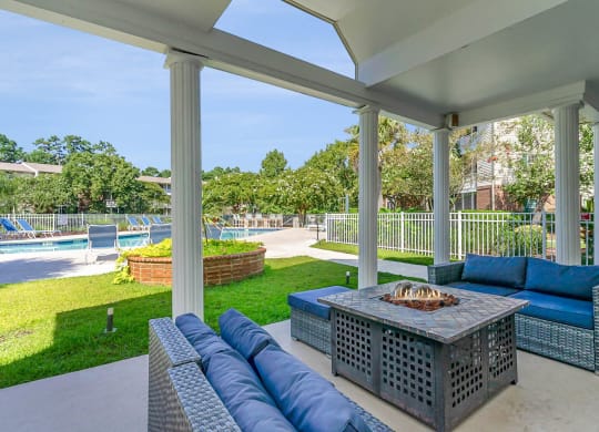 Outdoor Lounge With Firepit at Litchfield Oaks Apartments, Pawleys Island, SC, 29585
