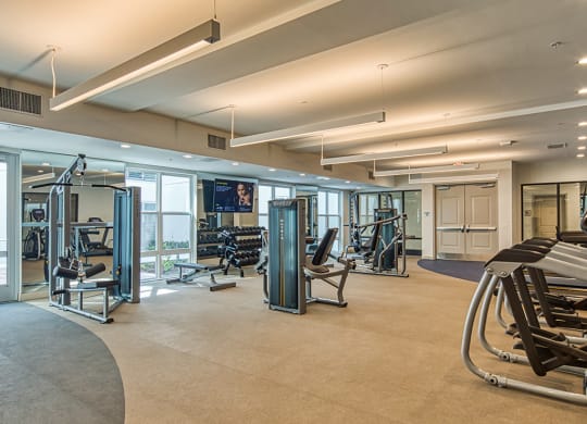 gym at Axis at PTC apartments in Hampton VA