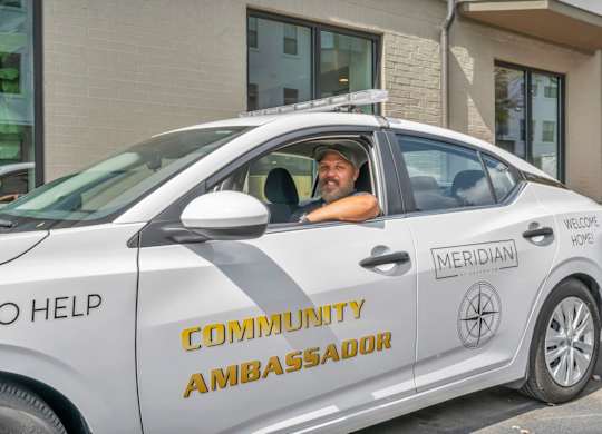 A white car with the words