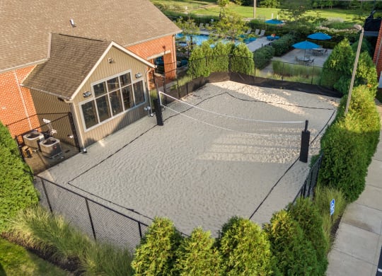 an aerial view of a backyard with a tennis court at Hayden Lofts, Dublin, 43016