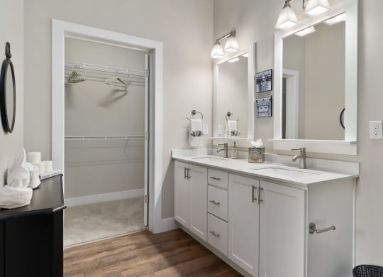 a bathroom with a sink and a mirror and a shower at Hayden Lofts, Dublin, 43016