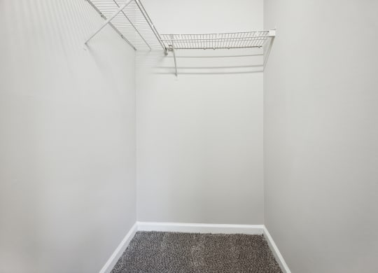 a walk in closet in a 555 waverly unit