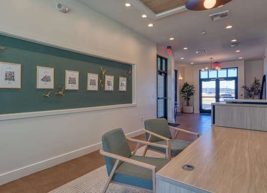 a conference room with a green wall and a table and chairs