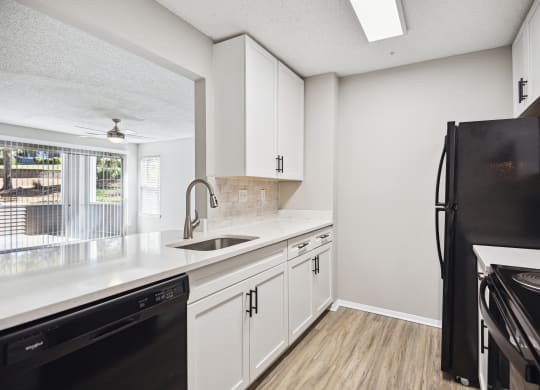 the preserve at ballantyne commons apartment kitchen with stainless steel appliances