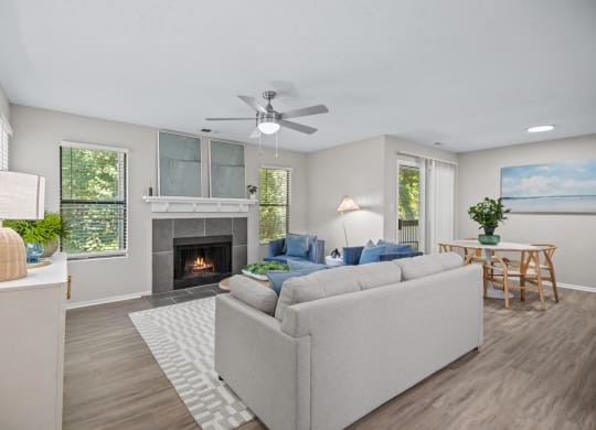 a living room with a couch and a fireplace