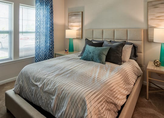 Bed  next to windows