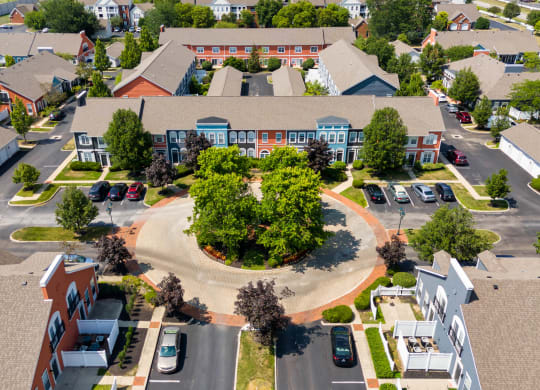 an aerial view of a neighborhood with houses and trees at Orleans Apartments, Columbus, Ohio