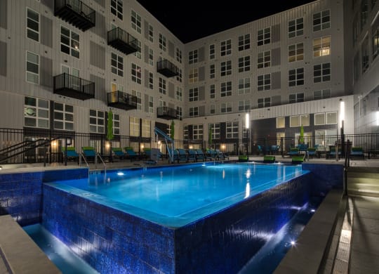 Pool at night at The Current Apartments in Richmond VA
