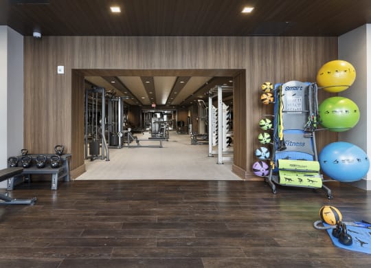 a view of the fitness center with weights and other exercise equipment in a building withat Preston Centre, Ohio, 43215