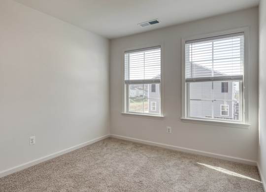 Carpeting In Bedrooms with wide windows at The Mark, Harrisonburg