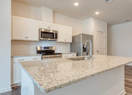 White Cabinetry And Appliances In Kitchen at The Mark, Virginia