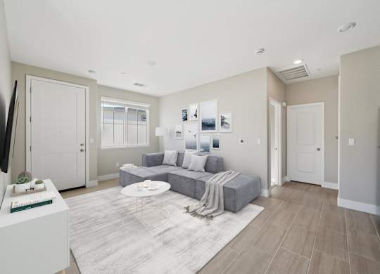 Living Room with a White Coffee Table at Montessa Apartments, Vacaville, CA