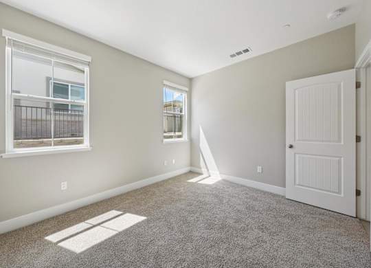 A Room with a Door at Montessa Apartments, California