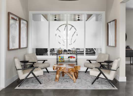 A modern living room with a large chandelier and a fireplace.