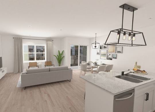 A modern living room with a grey sofa and a television.