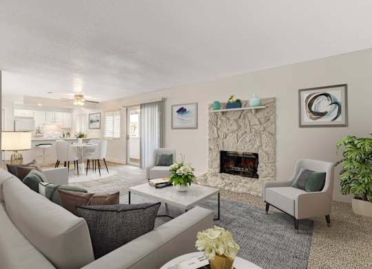 A living room with a fireplace and a dining table.