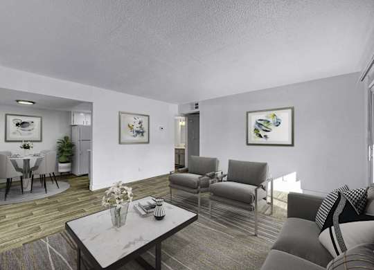 A living room with a grey couch and a coffee table.