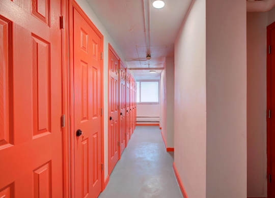 Storage rooms with red doors.