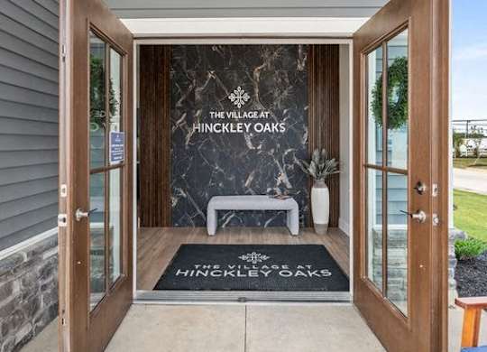 The entrance to The Village at Hinckley Oaks is shown.