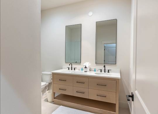 A bathroom with a vanity and a toilet at Westgate Apartment Homes, Pendleton, OR, 97801