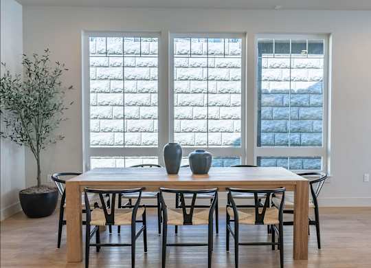 A dining room with a table and chairs at Westgate Apartment Homes, Pendleton, OR